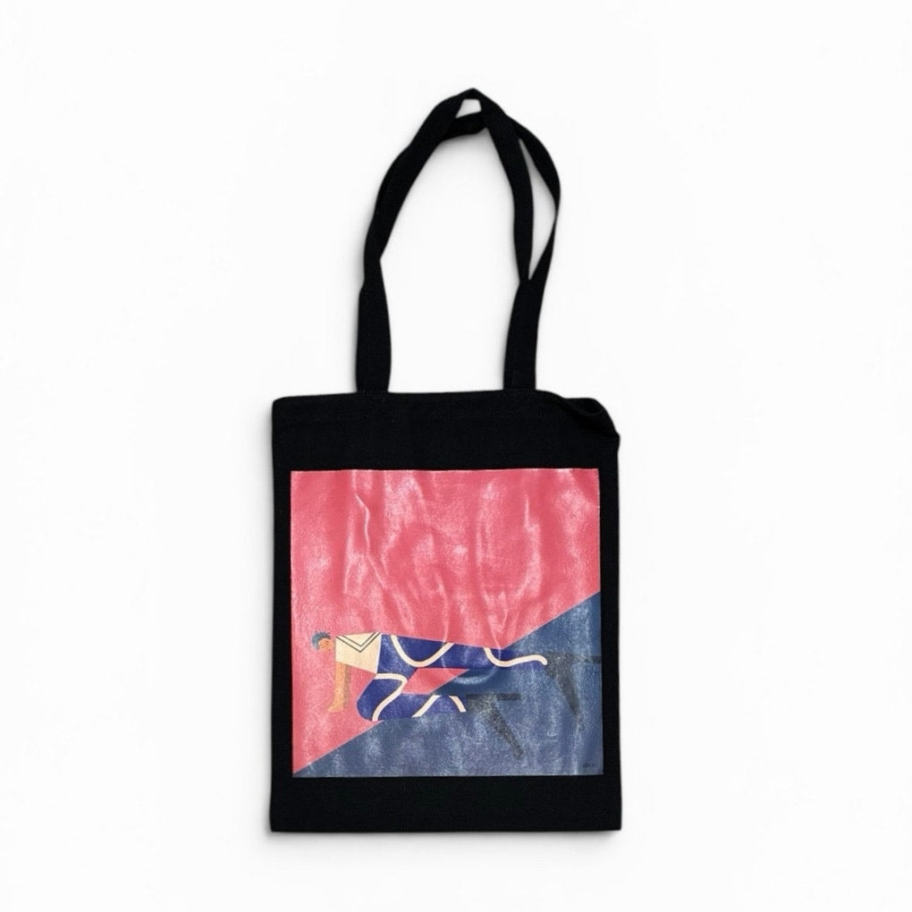 black tote bag featuring an artistic graphic print 13” W X 17” L