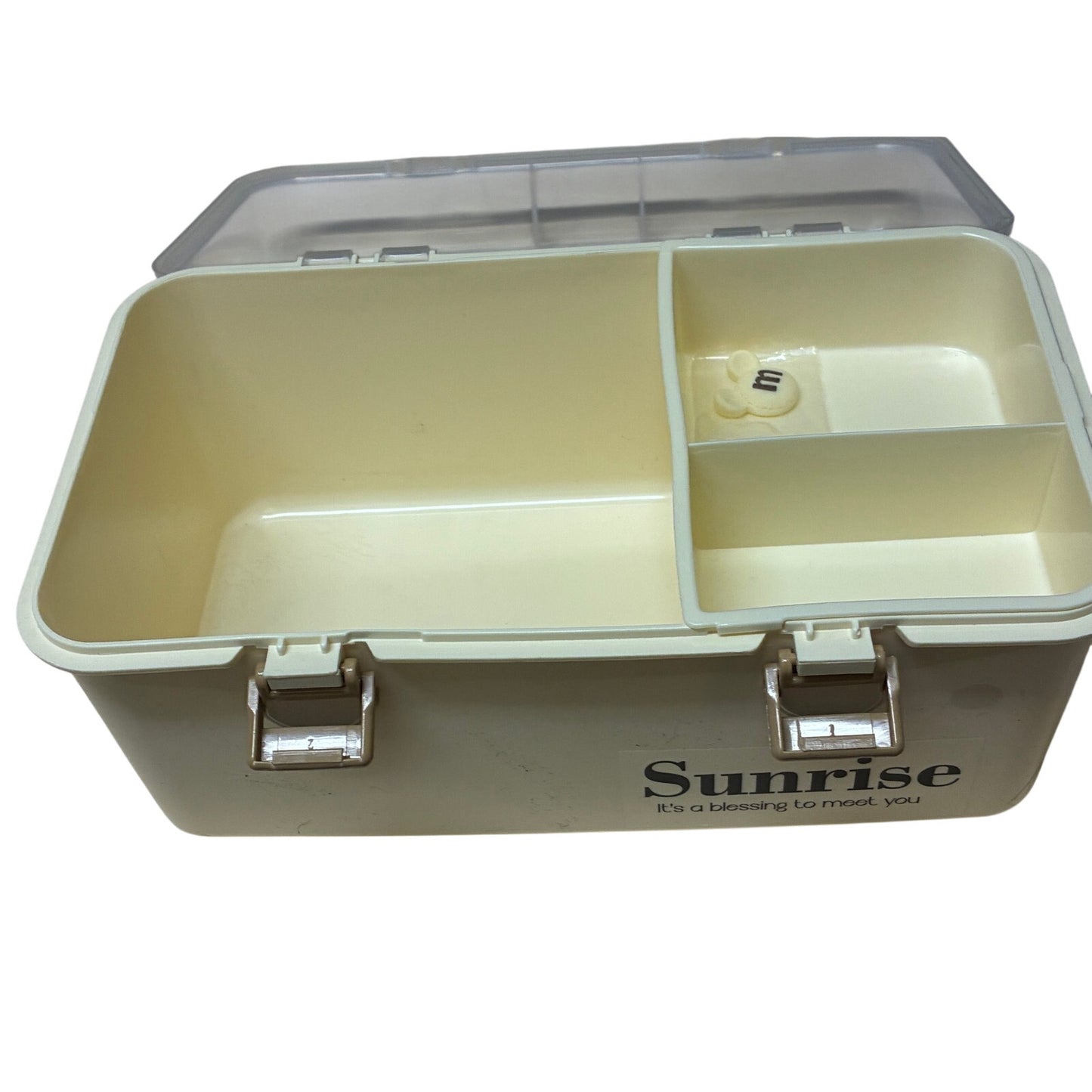cream-colored plastic medicine storage box with a transparent lid