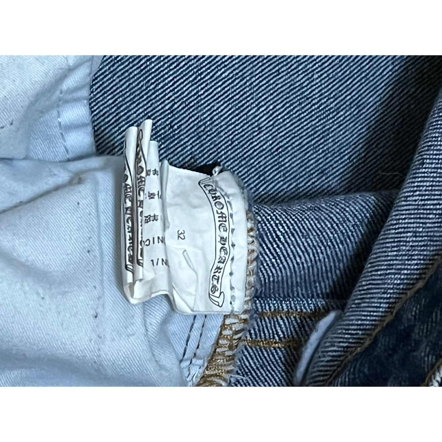 Men’s Blue Jeans With Black Crosses On Them