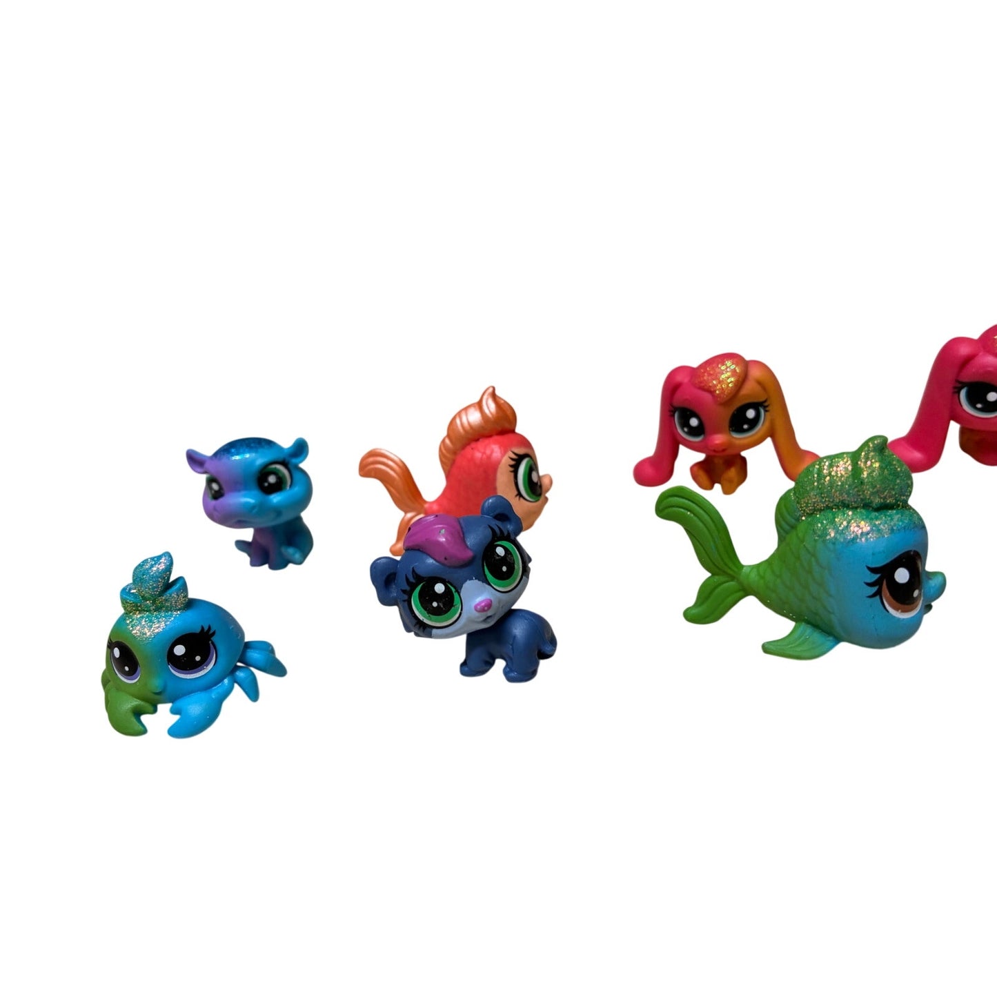 10 Pcs collection of Hasbro Littlest Pet Shop (LPS) mini figures.