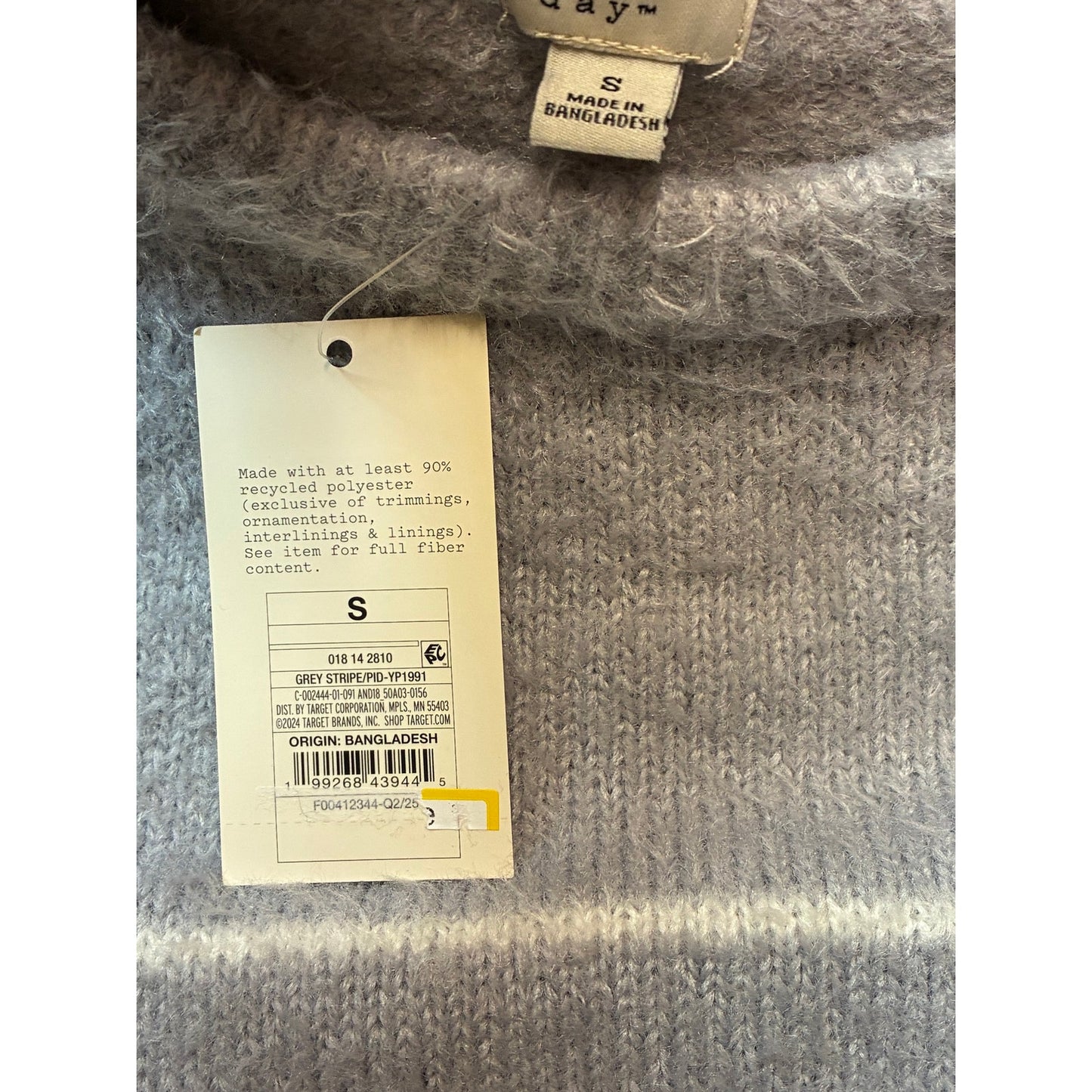 A New Day Women’s Long Sleeve Fuzzy Pullover Sweater With White Stripes On It
