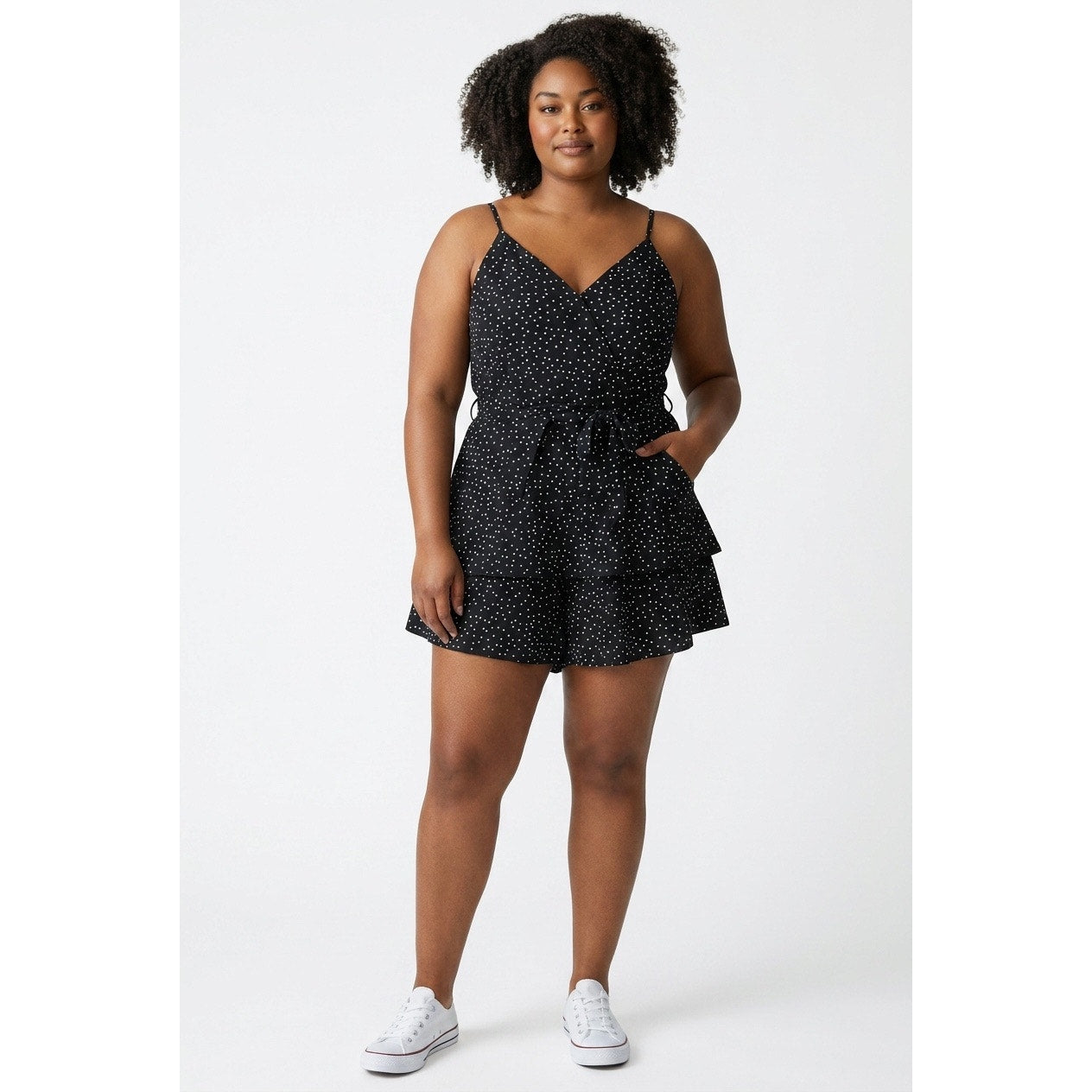 SHEIN jumpsuit features a black and white polka dot pattern ruffled tie waist