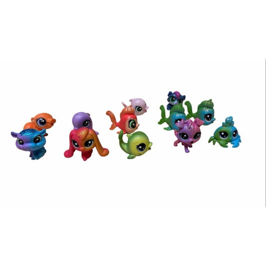 12 Pcs collection of Hasbro Littlest Pet Shop (LPS) mini figures.
