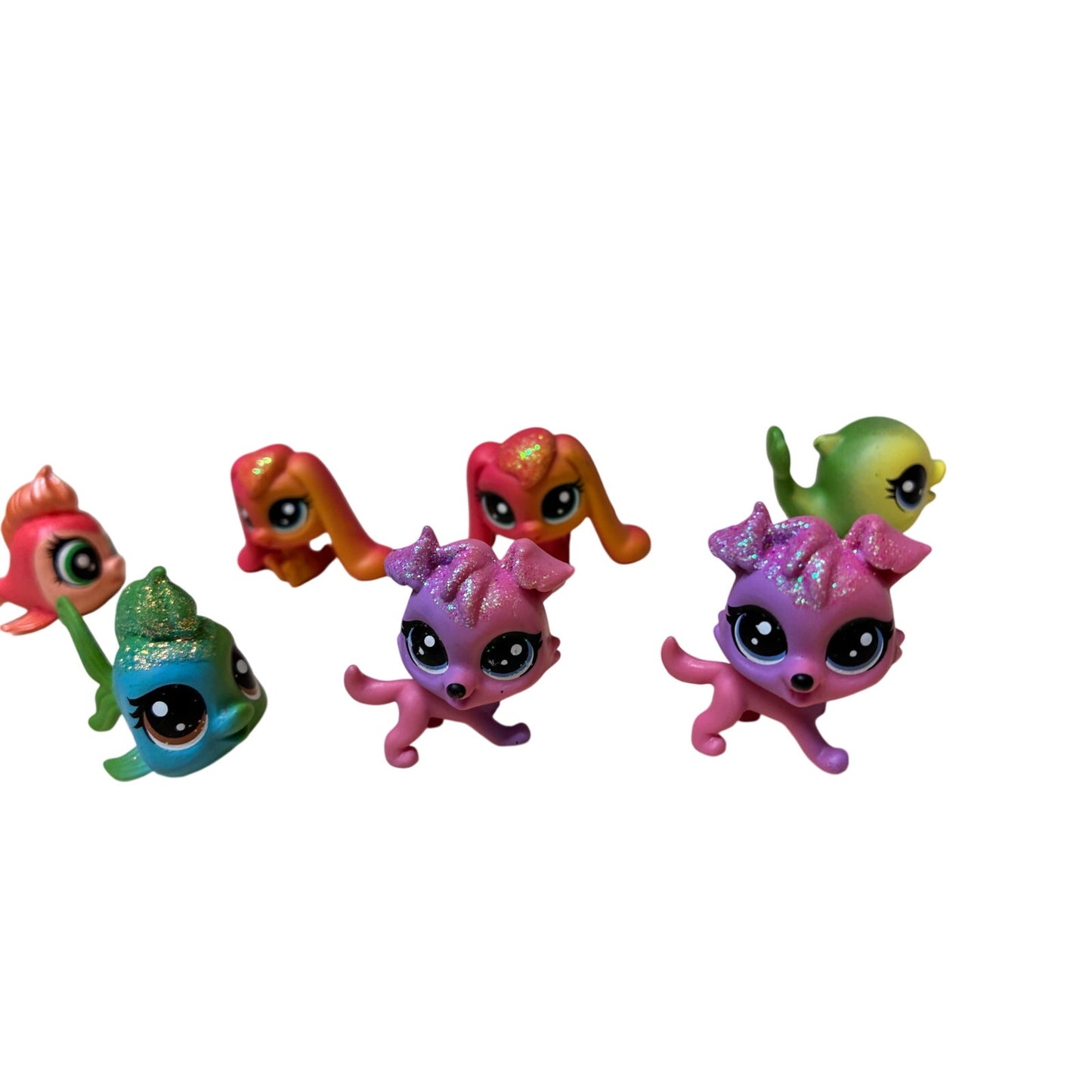 10 Pcs collection of Hasbro Littlest Pet Shop (LPS) mini figures.