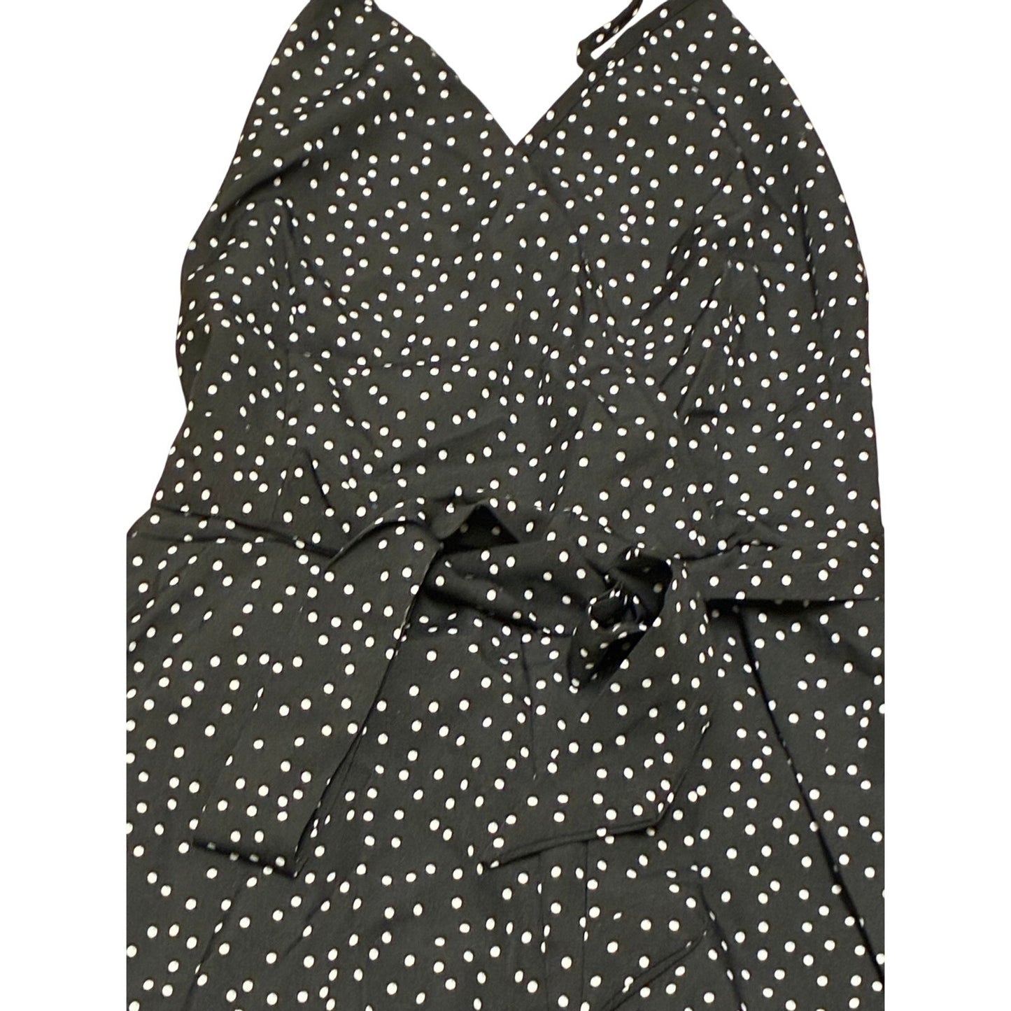 SHEIN jumpsuit features a black and white polka dot pattern ruffled tie waist