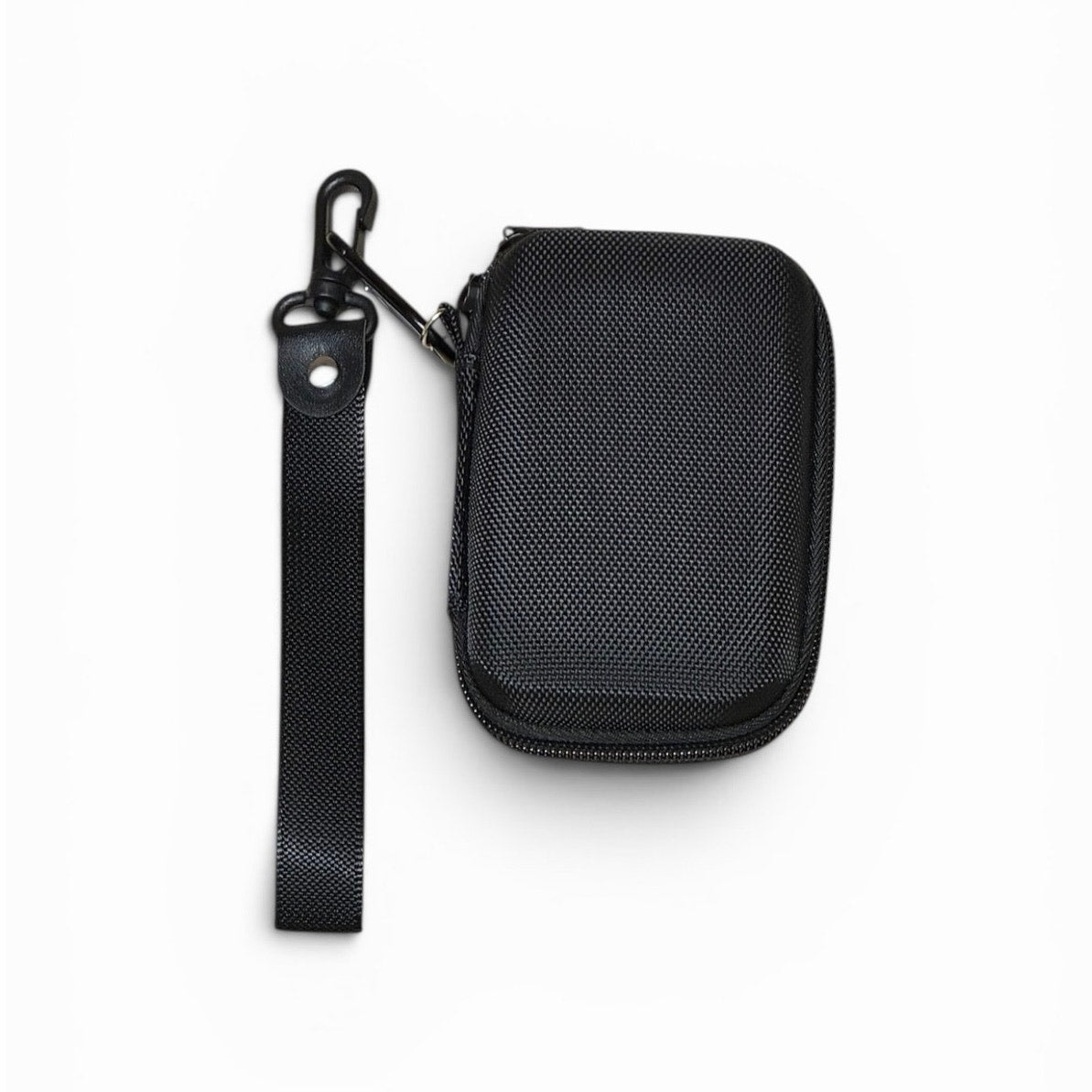 black hard shell travel pouch 4” L X 3” W