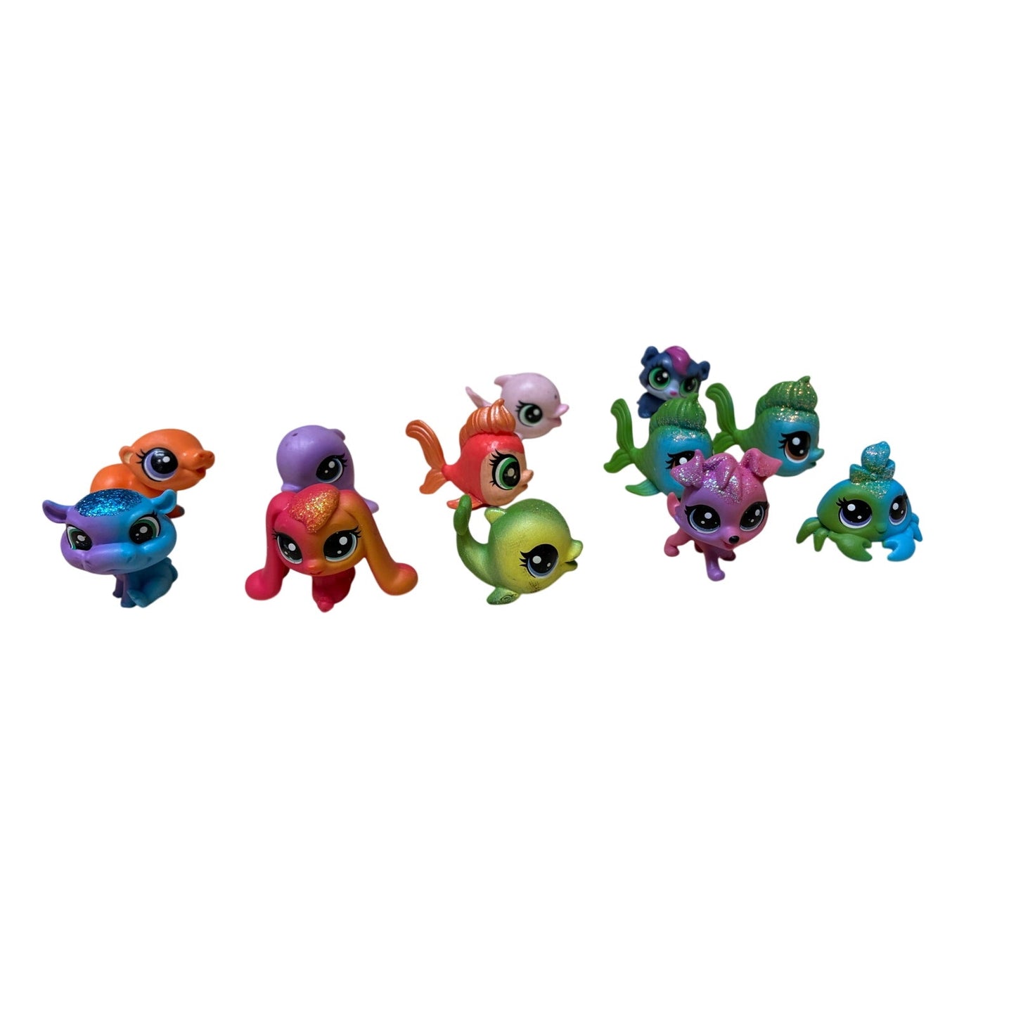 12 Pcs collection of Hasbro Littlest Pet Shop (LPS) mini figures.