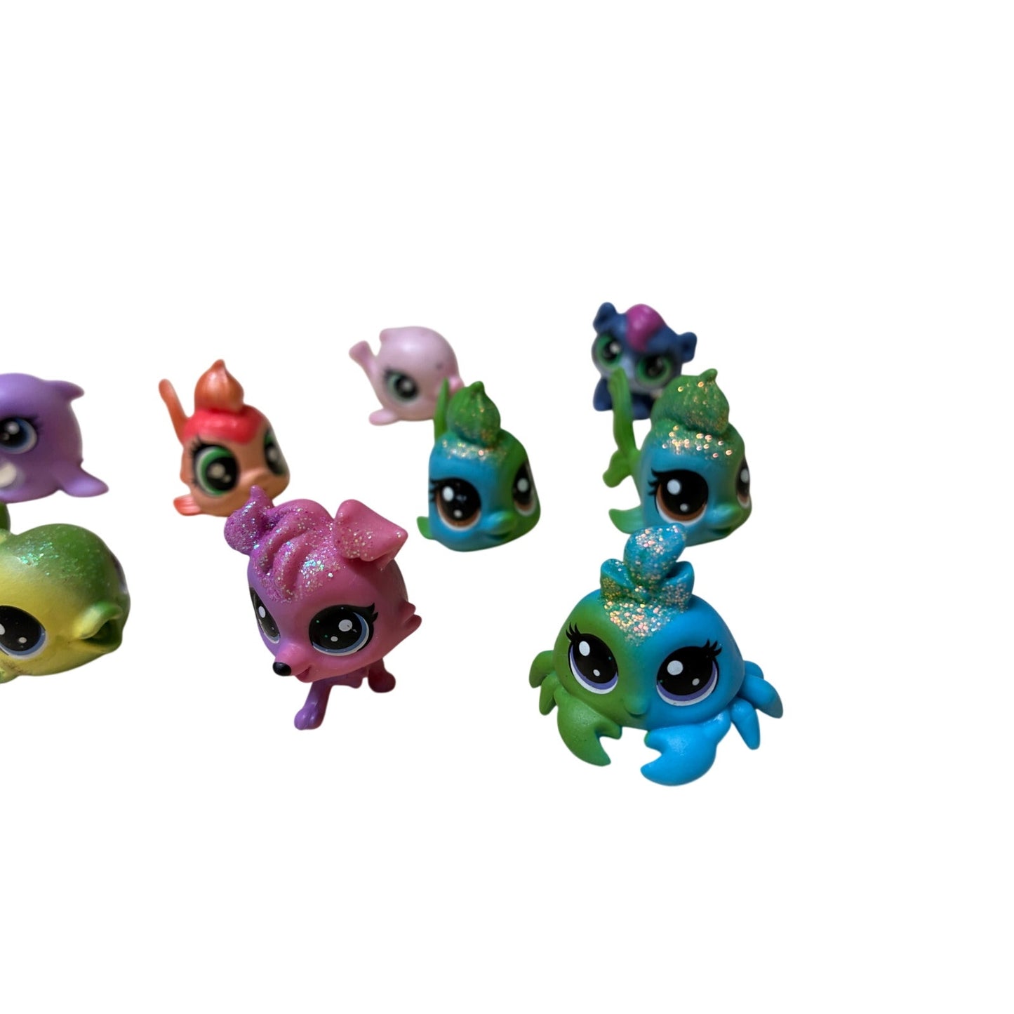 12 Pcs collection of Hasbro Littlest Pet Shop (LPS) mini figures.