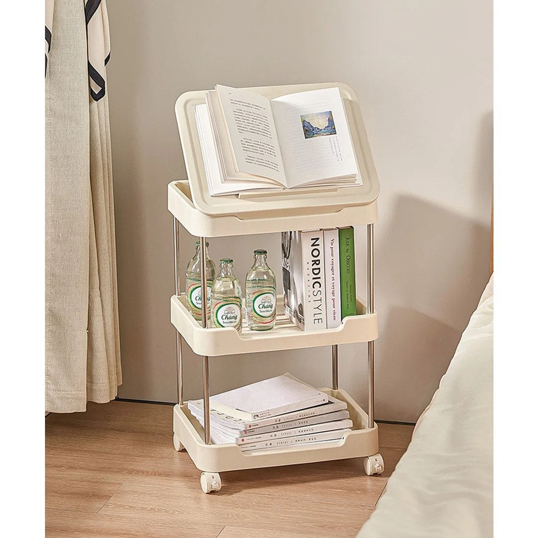 3-tier rolling utility cart with a top handle and drawer feature.