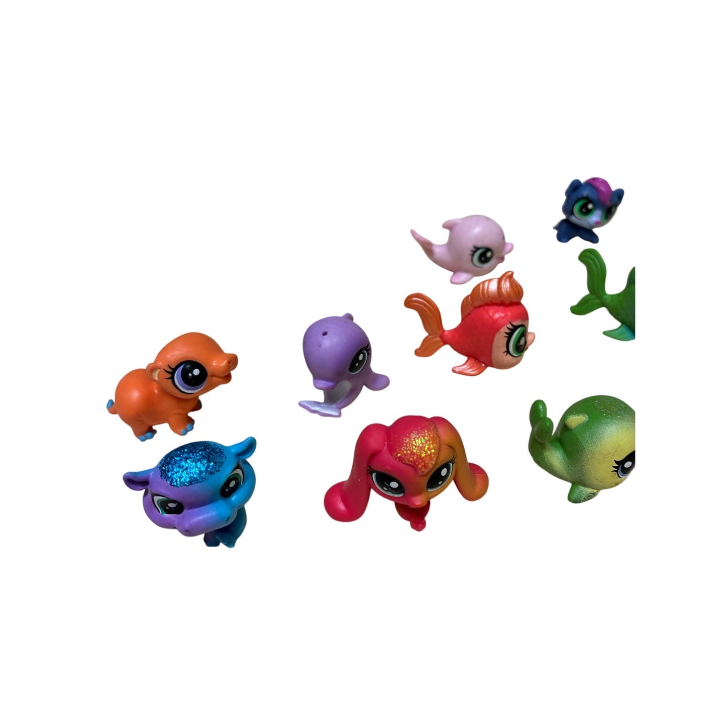 12 Pcs collection of Hasbro Littlest Pet Shop (LPS) mini figures.