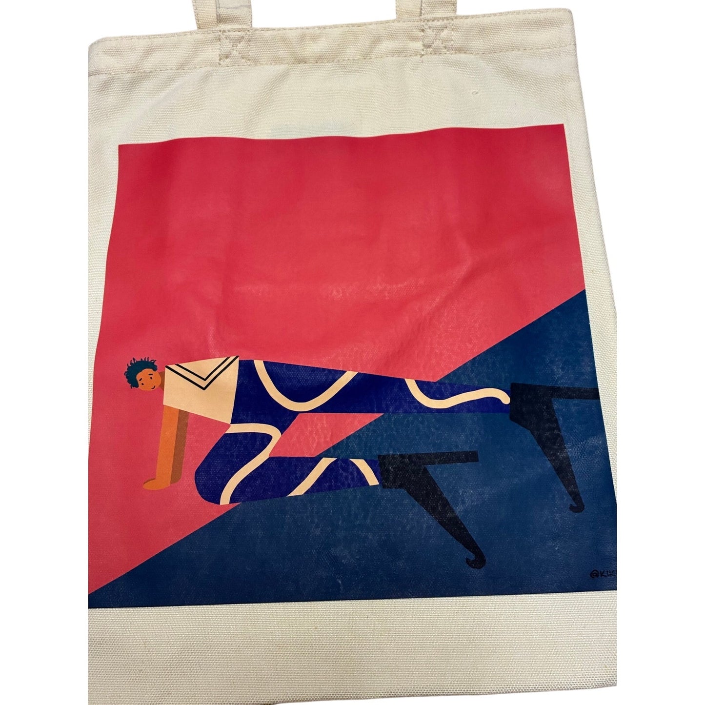 black tote bag featuring an artistic graphic print 13” W X 17” L
