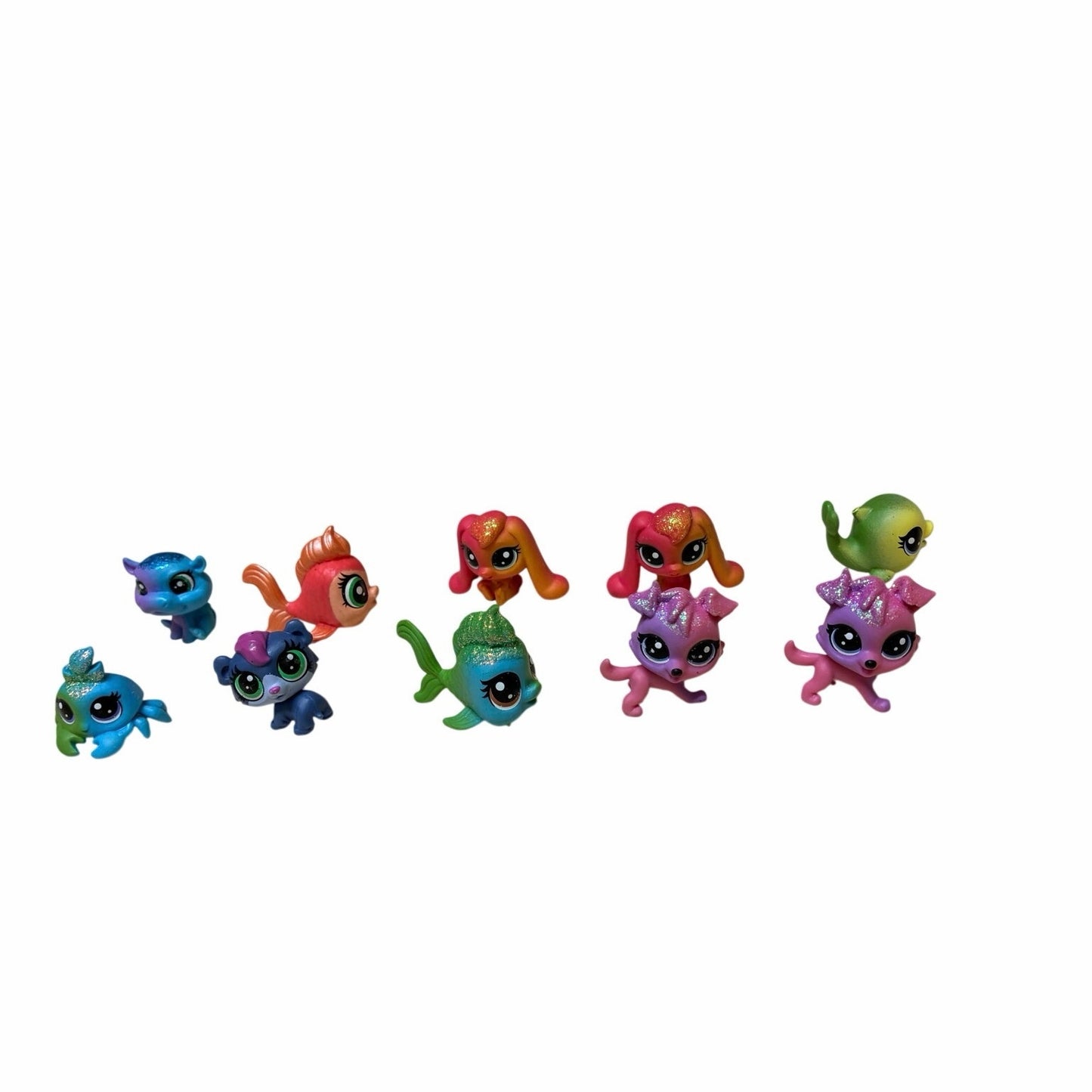 10 Pcs collection of Hasbro Littlest Pet Shop (LPS) mini figures.