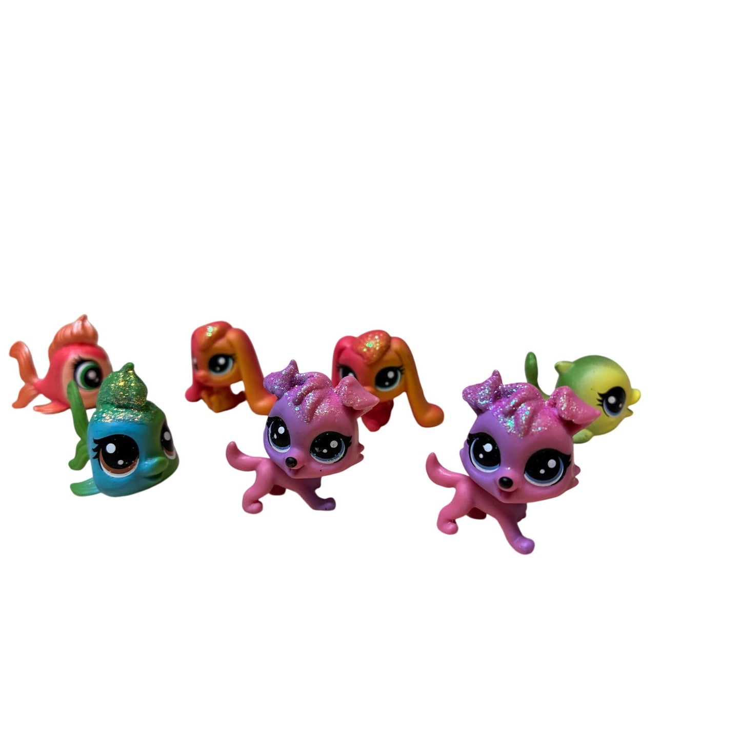 10 Pcs collection of Hasbro Littlest Pet Shop (LPS) mini figures.