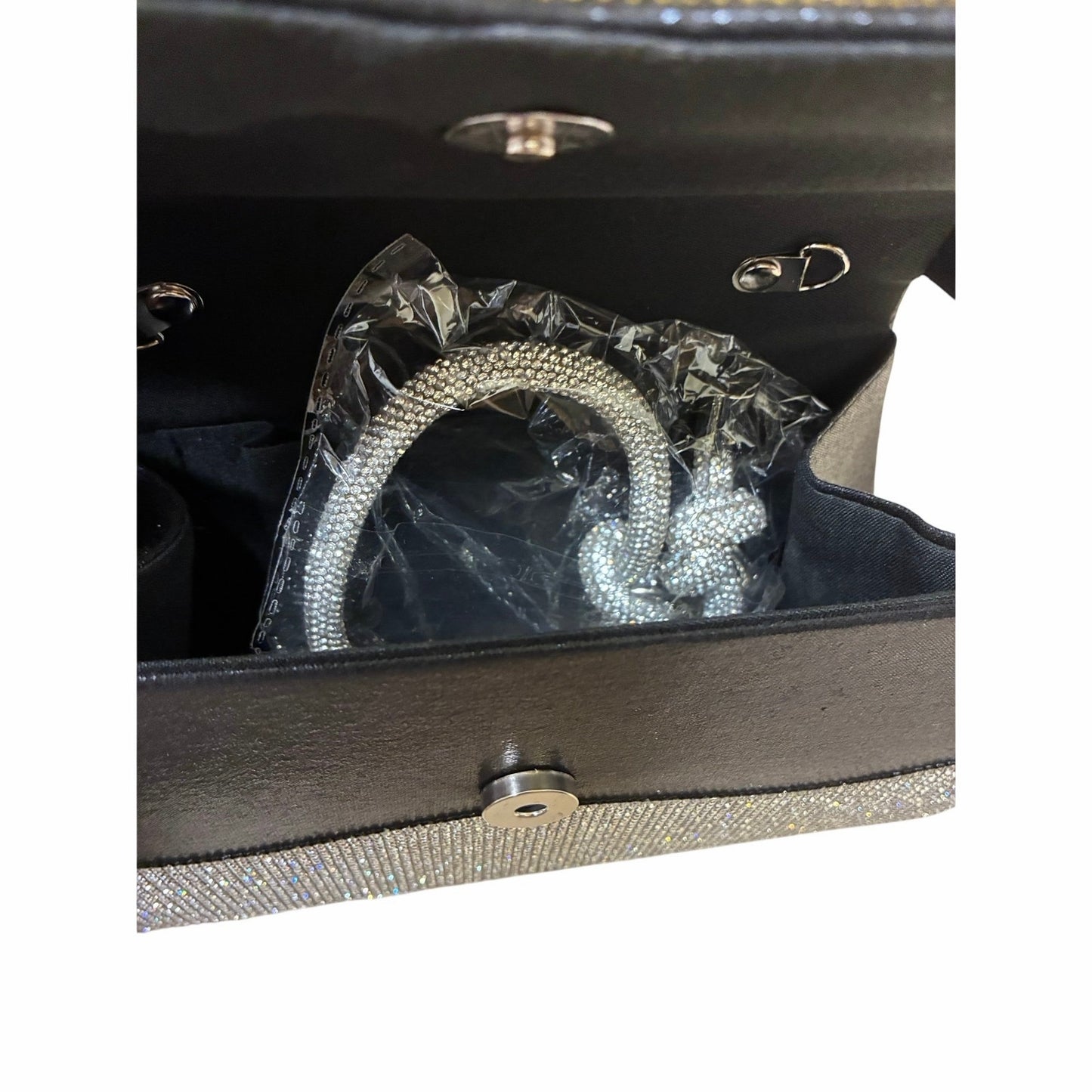 Women’s purse with silver rhinestones all over it 8” X 6”