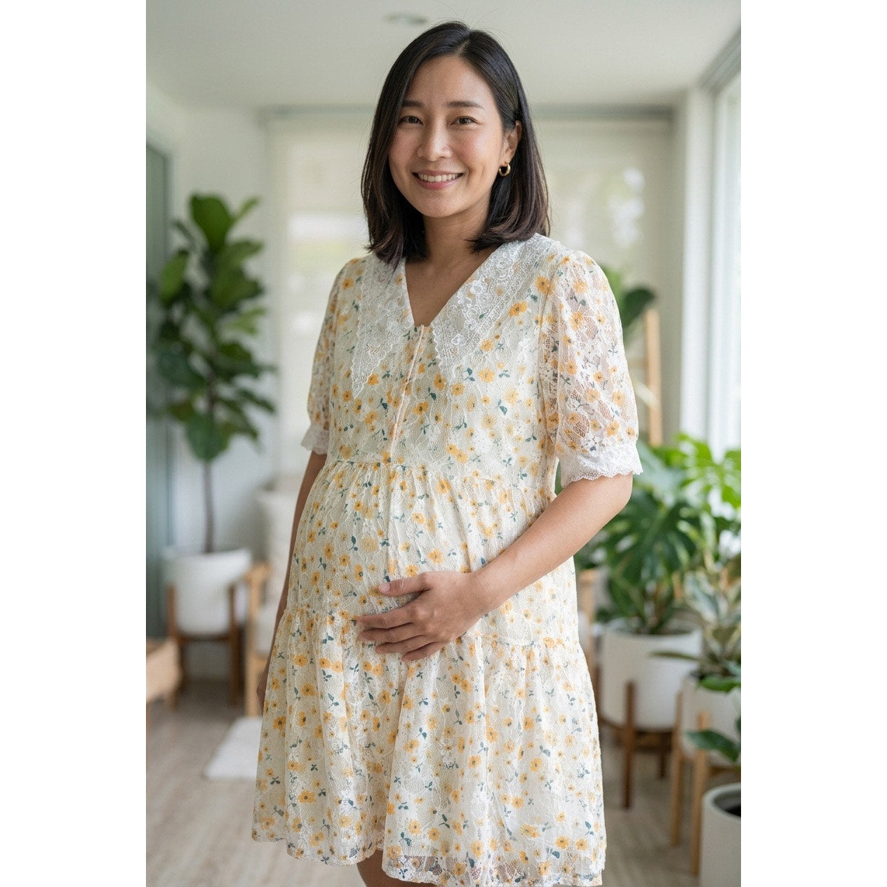 Fisher-Price Women’s maternity dress featuring a yellow floral print Size XL