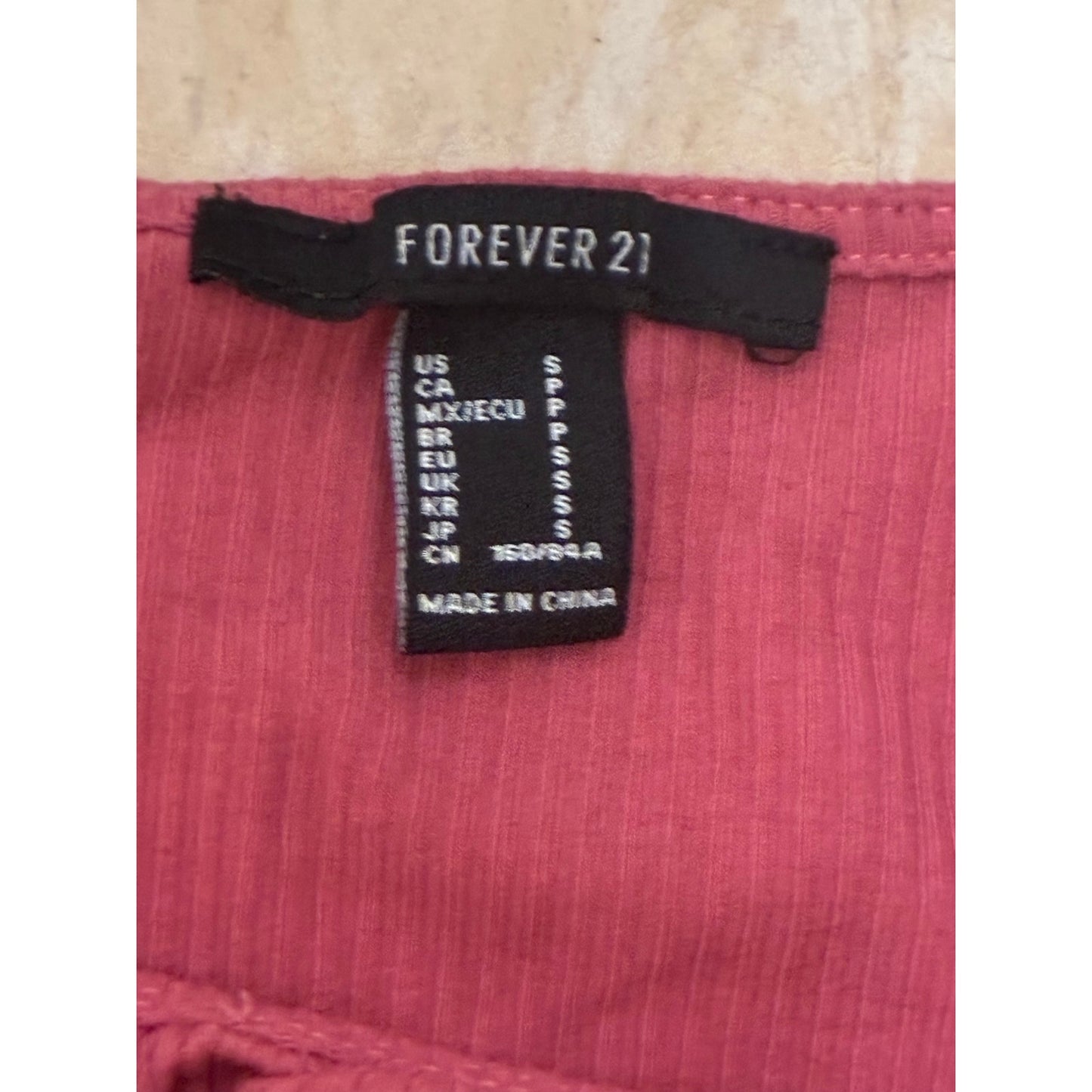 Forever 21 pink long-sleeve crop top featuring a square neckline
