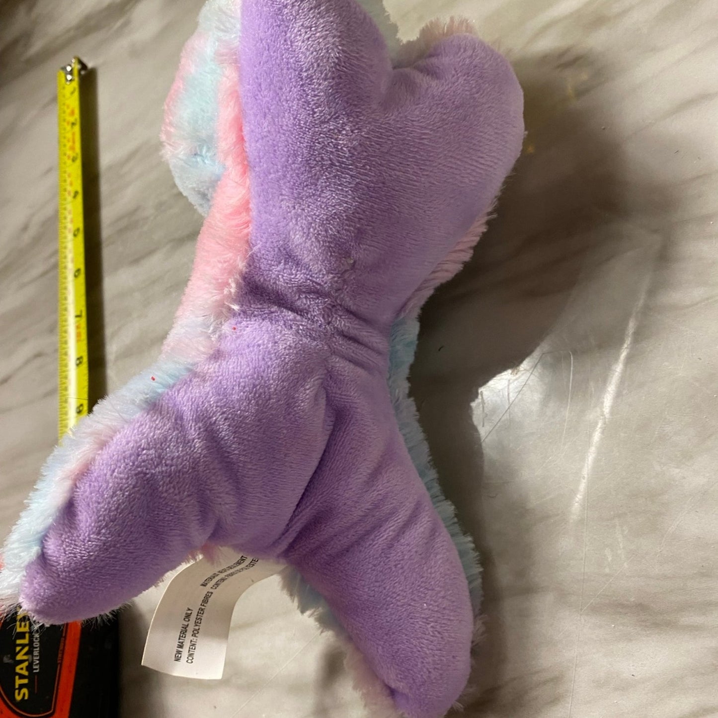 Colorful stuffed animal 11”