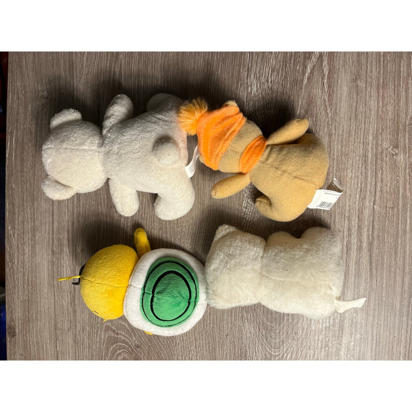 A bundle of four stuffed animals 4 inches
