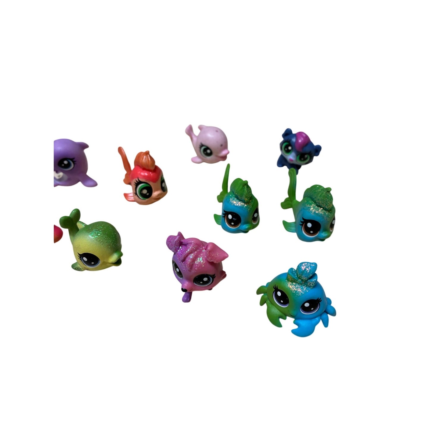 12 Pcs collection of Hasbro Littlest Pet Shop (LPS) mini figures.