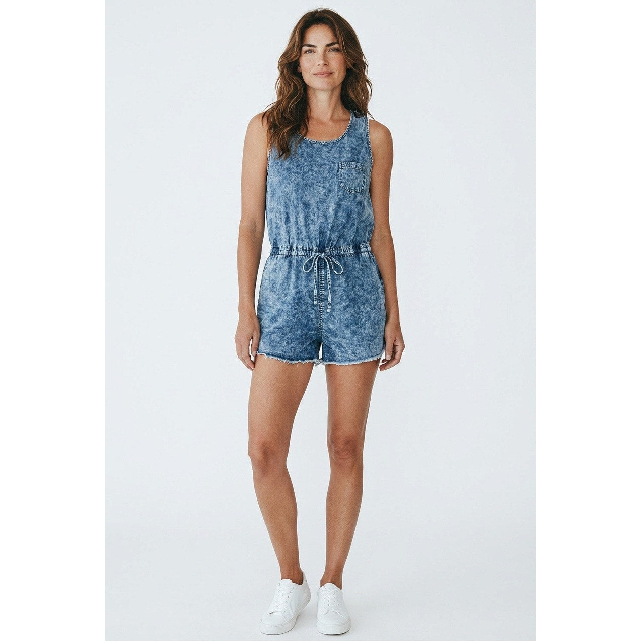 Forever 21 denim romper features a distinct exposed back zipper