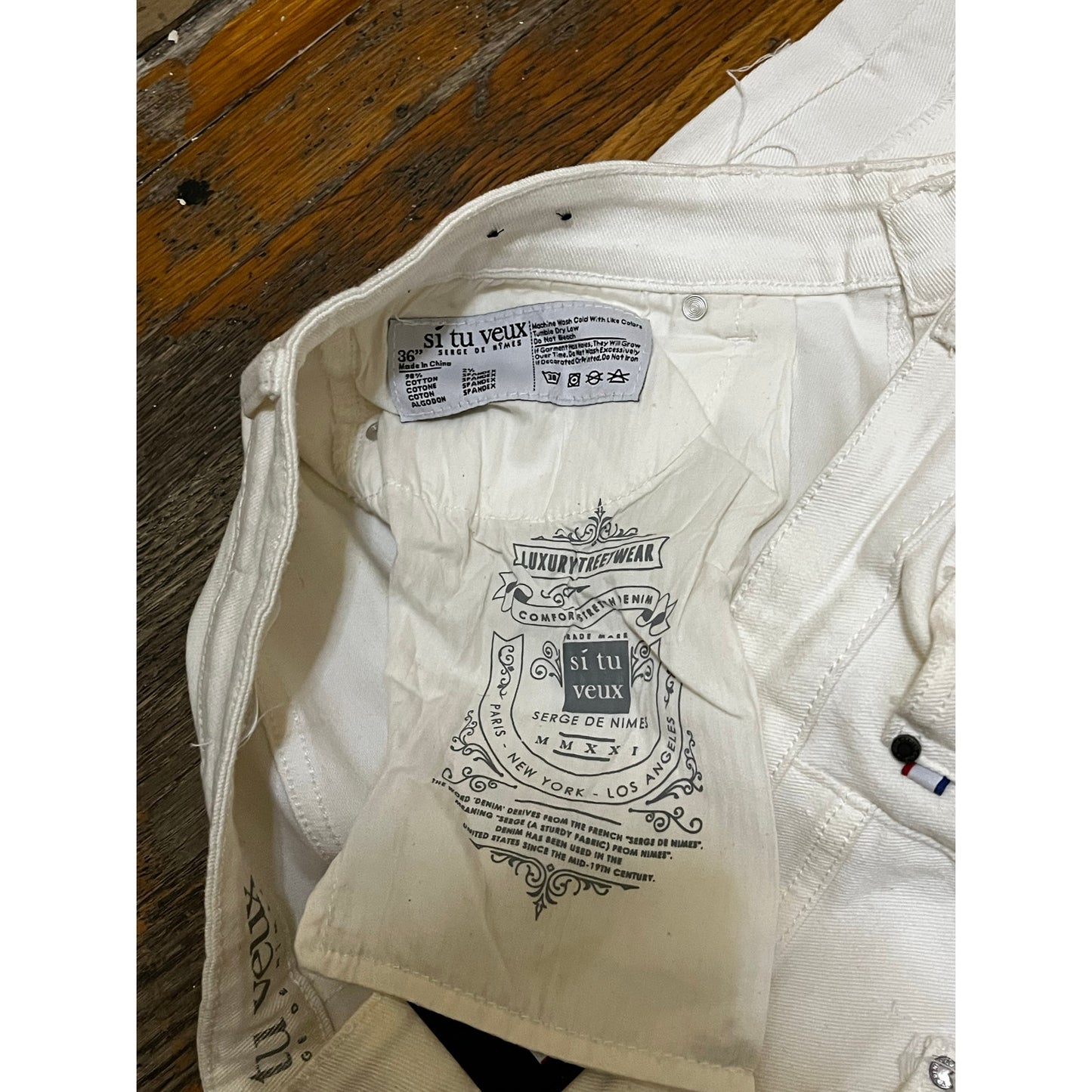 Si Tu Veux White Superstack Jeans With Blue patches Size 36